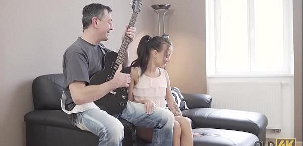  OLD4K. Young lassie makes some noise with old bass-guitar player